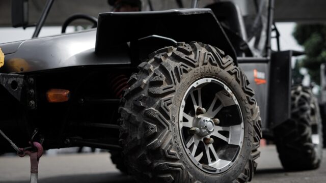 black and gray wheel with tire