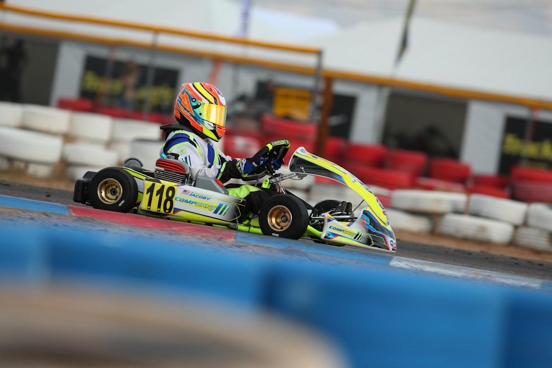 man riding on go kart