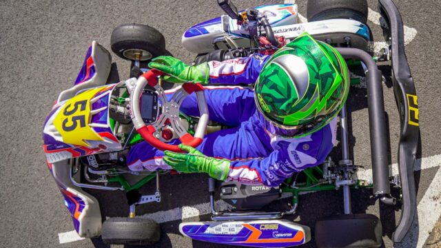 Driver in racing suit on a go-kart