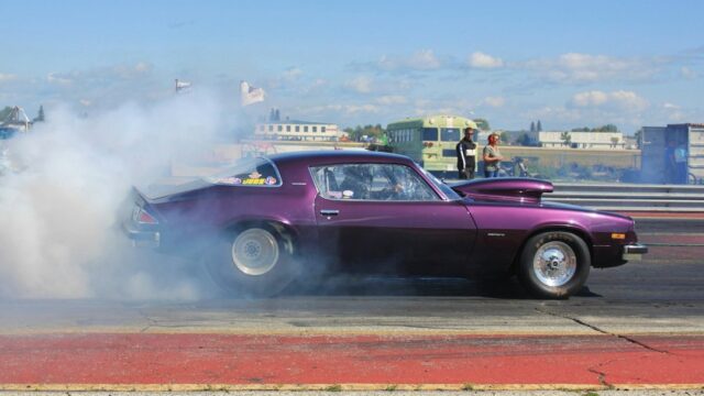 Purple coupe burning out on road during daytime — Drag Racing Go-Karts