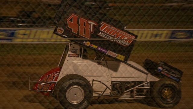 Sprint car racing on a dirt track at night — Electric Shifter Kart